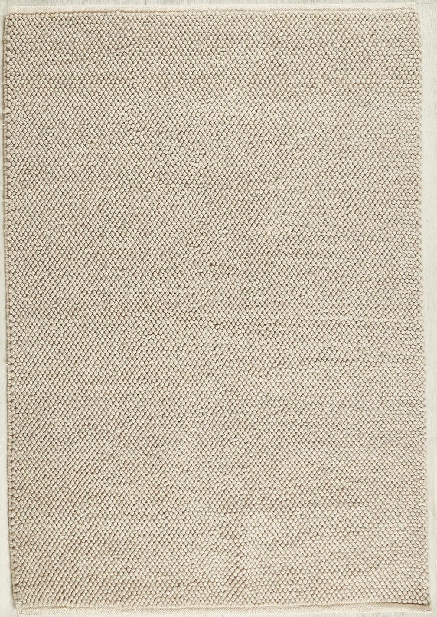 La Playa Hand Woven Pebble Wool Rug in Natural