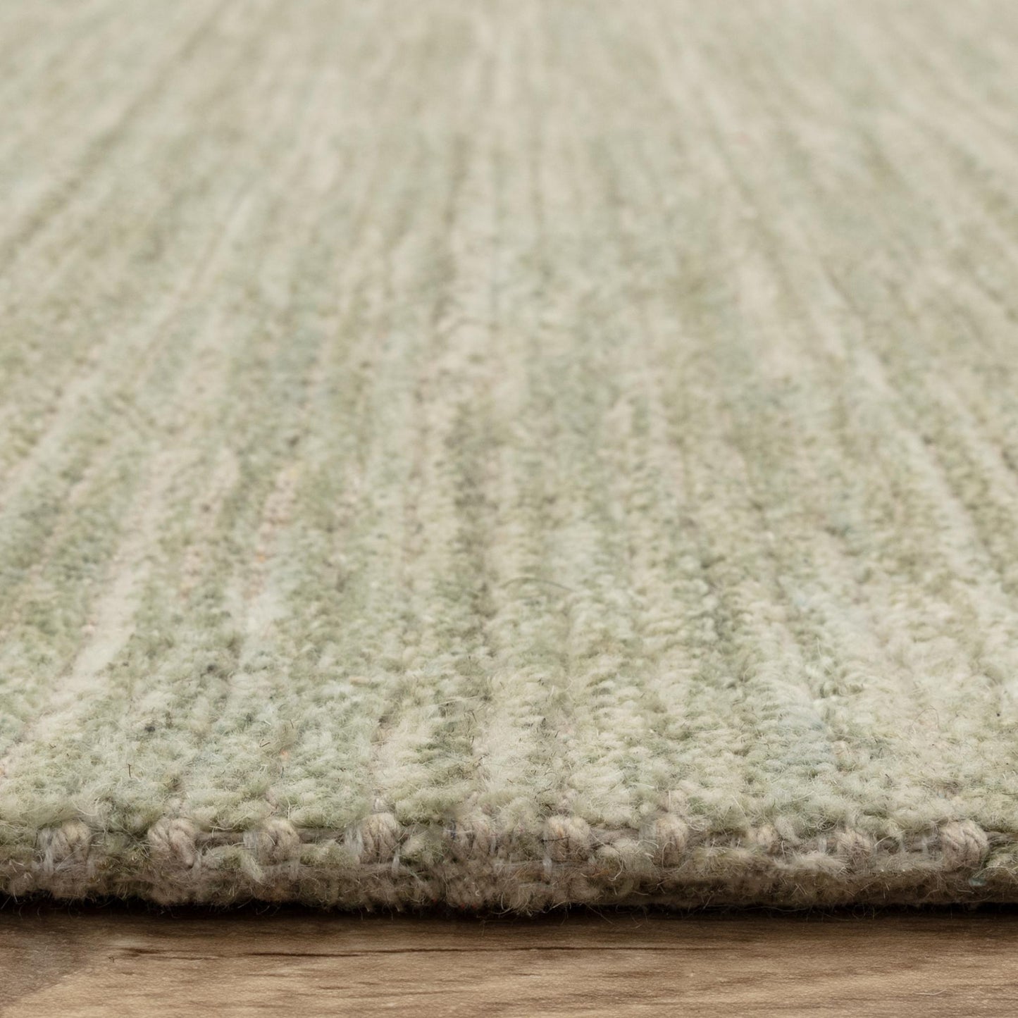 Hazy Pistachio Green Handwoven Rug – Tip-Sheared Finish Soft Wool Blend Plain Striped Carpet for Modern Interiors