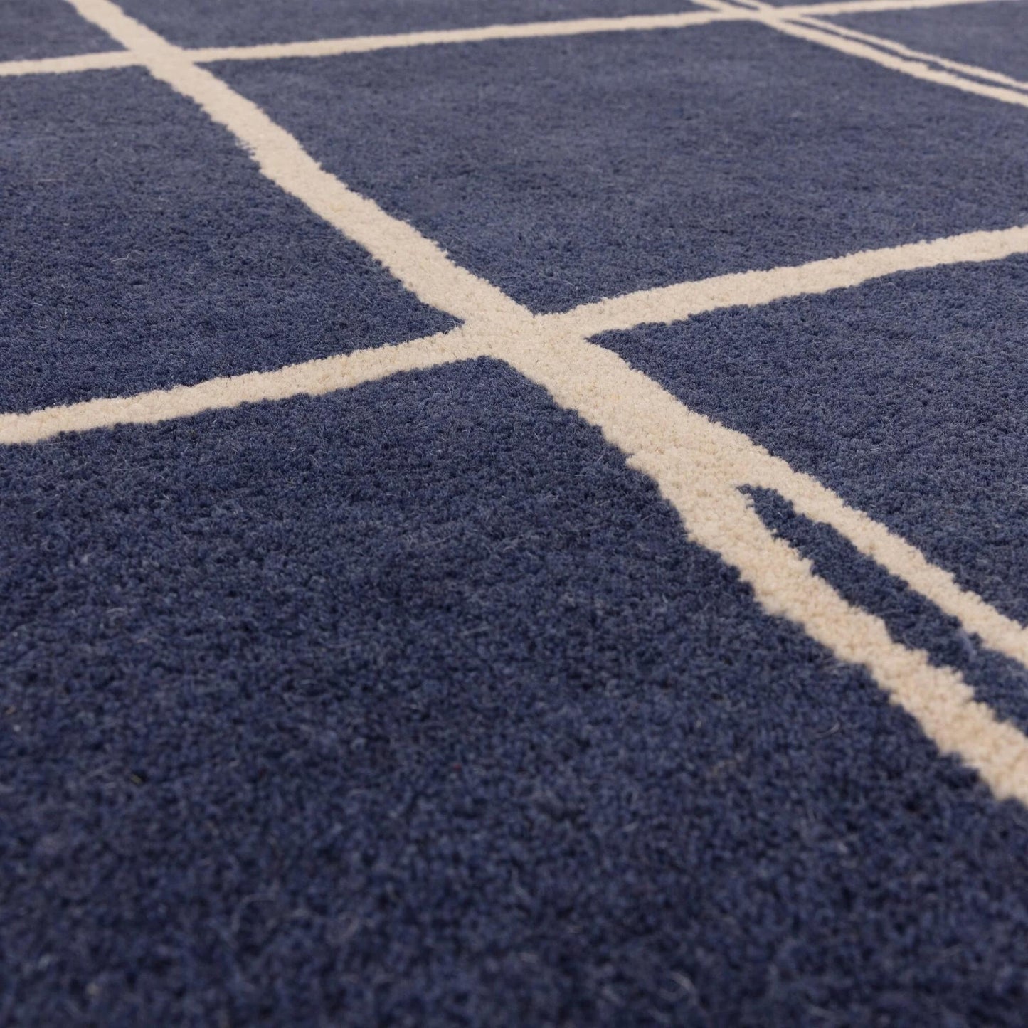 Albany Grid Marine Blue – Bold Geometric Intrigue and Natural Wool Luxury