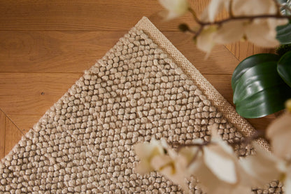 La Playa Hand Woven Pebble Wool Rug in Natural
